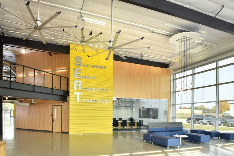 Interior entrance Commons with dramatic yellow signage