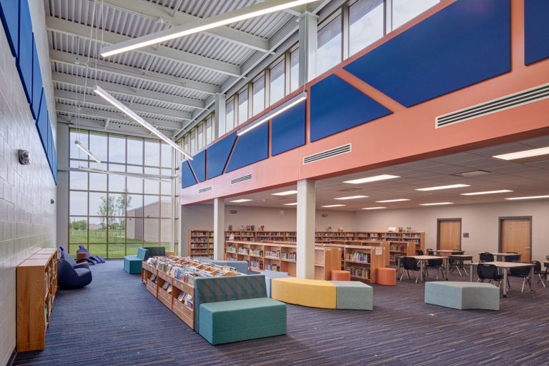 Angled shot of media center showing seating and natural light
