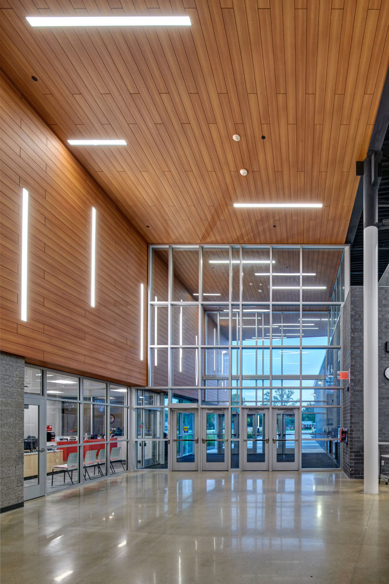 Entry with wood paneling details