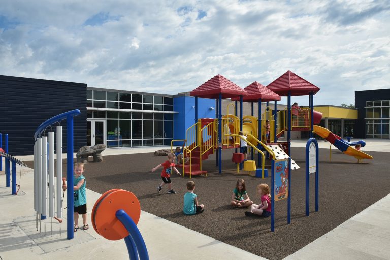 Outdoor playground with new play structures