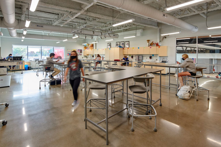 Science room with tables and students