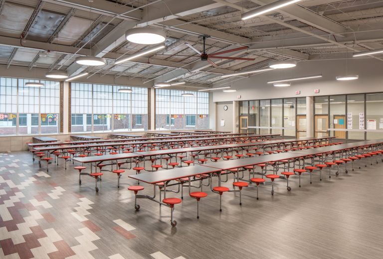 Cafeteria with tables and large windows