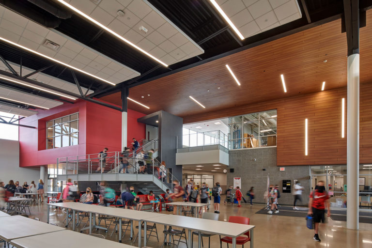 Commons with wood detailing and ceiling grid clouds