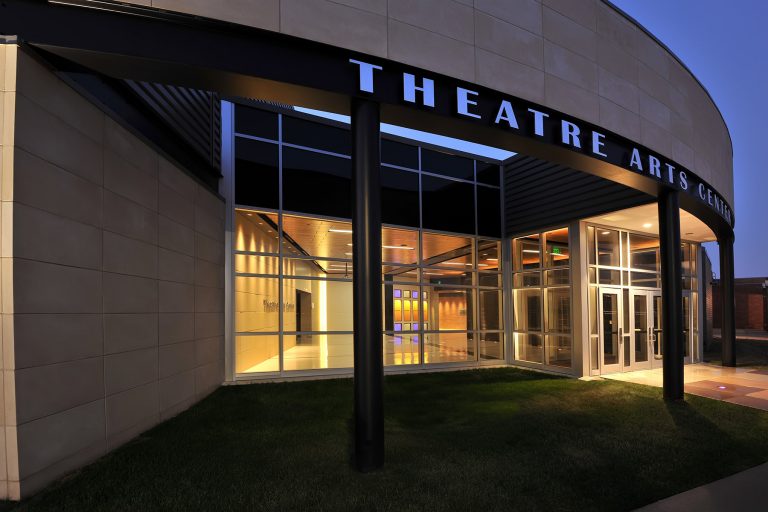 Exterior night shot into interior lobby