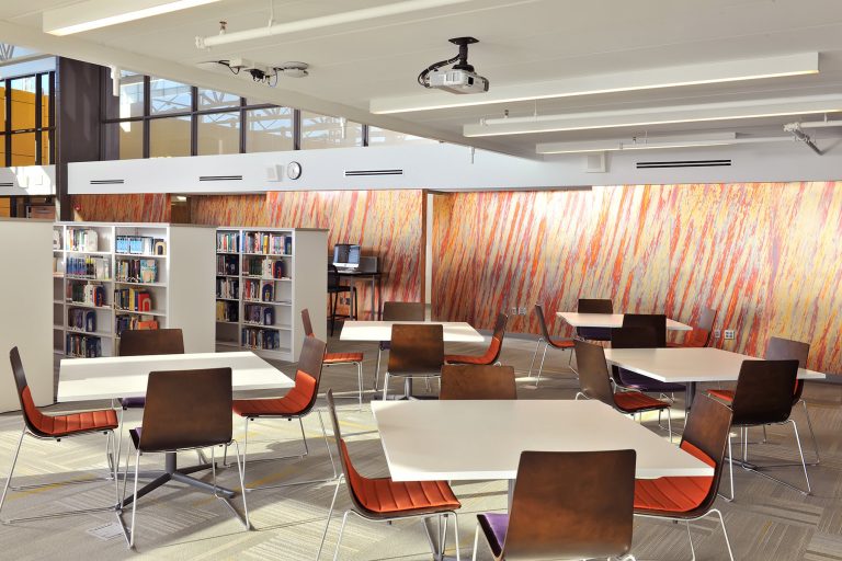 Media center interior with tables and chairs