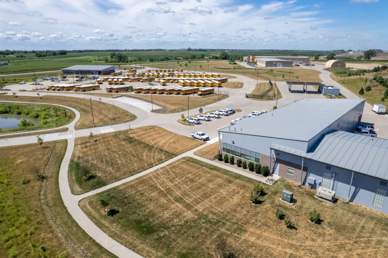 Drone shot of operations building and parking