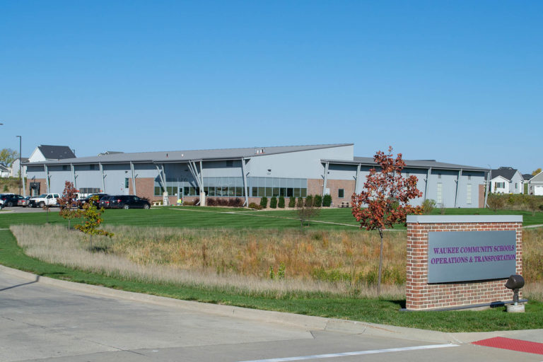 Exterior photo of building and sign