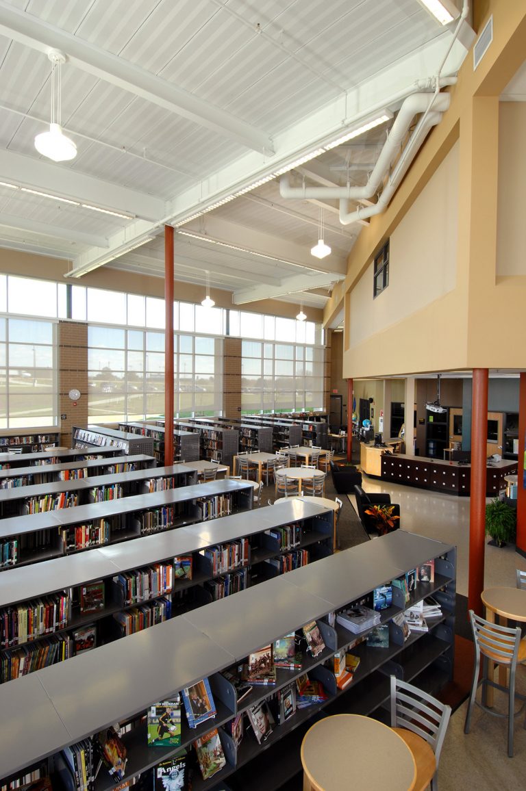 Library with stacks and large glass wall