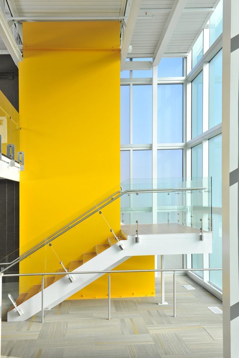 Interior stair with yellow highlight wall