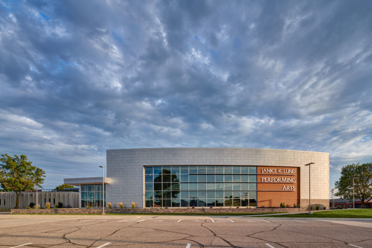 Exterior elevation with dramatic clouds