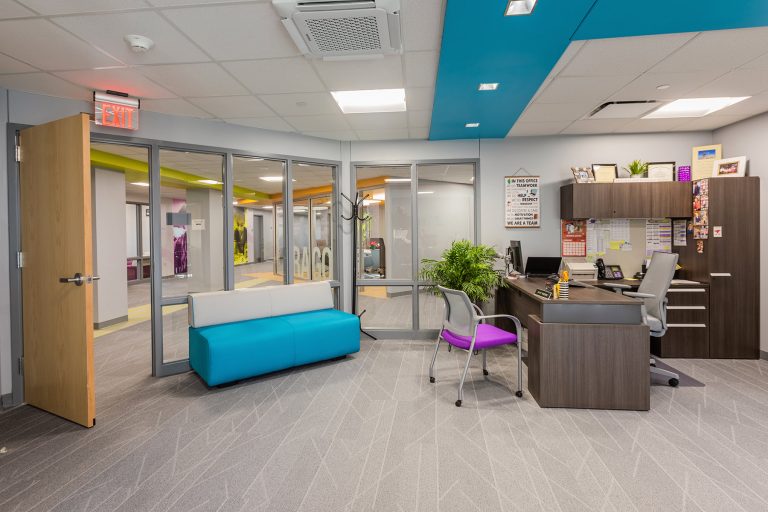 Office with blue ceiling detail elements