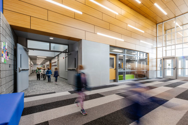 Entry with wood wall panels