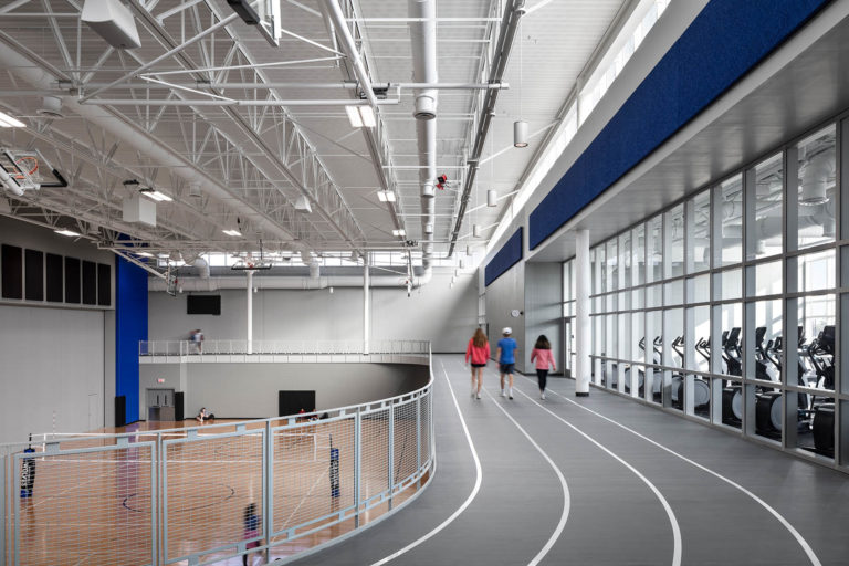 Raised track above basketball court below