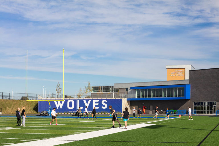 View from football field with students exercising