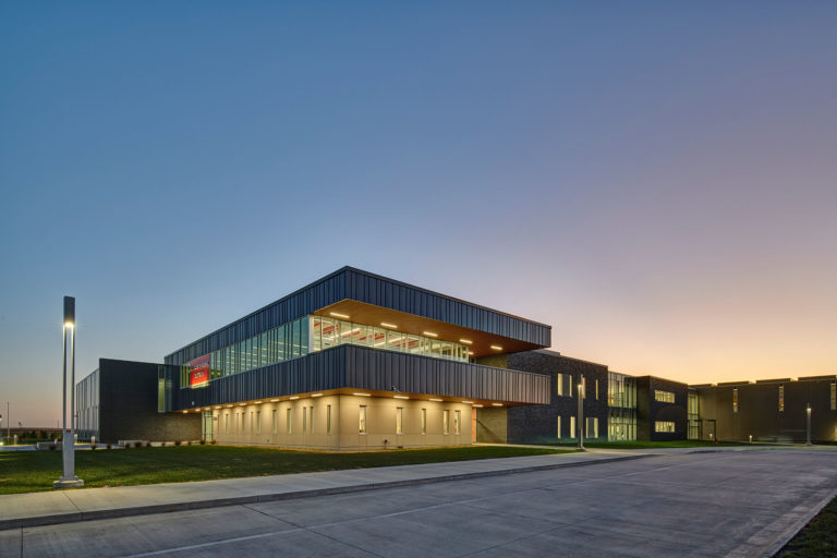 Exterior view of building corner at dusk