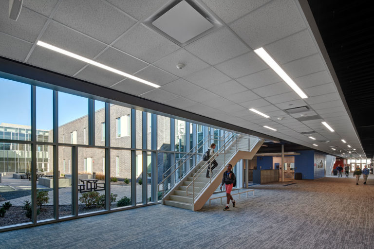 Circulation corridor with staircase to second level