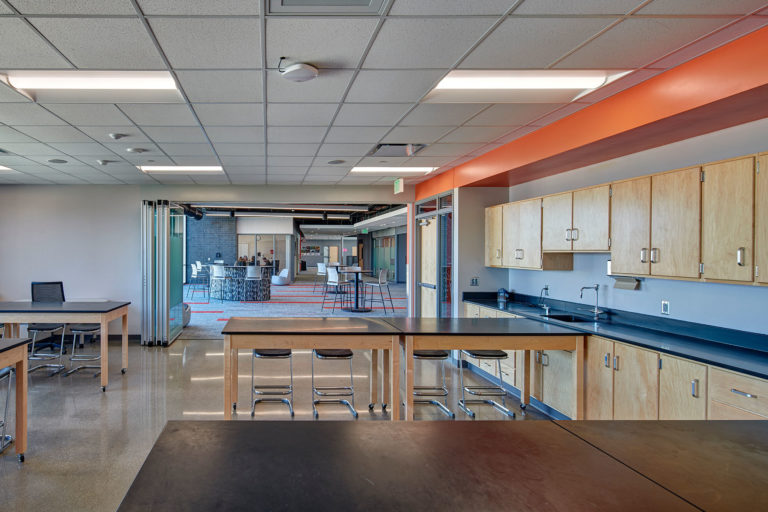 Science classroom looking out into hallway collaboration space