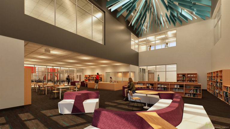 Library with plum furniture and light fixture