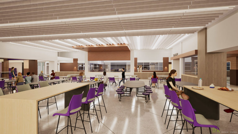 Commons with purple chairs and felt acoustic ceiling