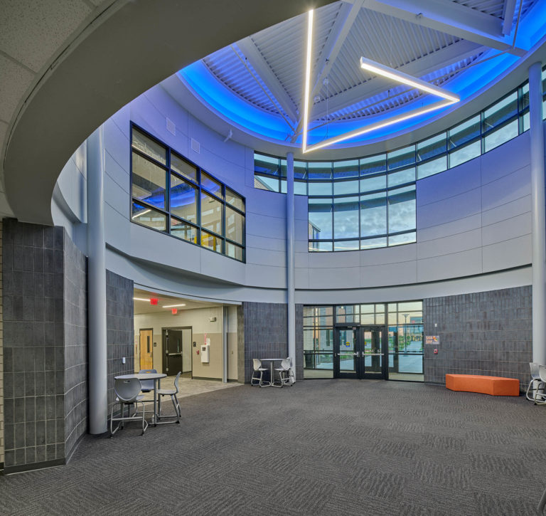 Main entry rotunda with blue accent lighting