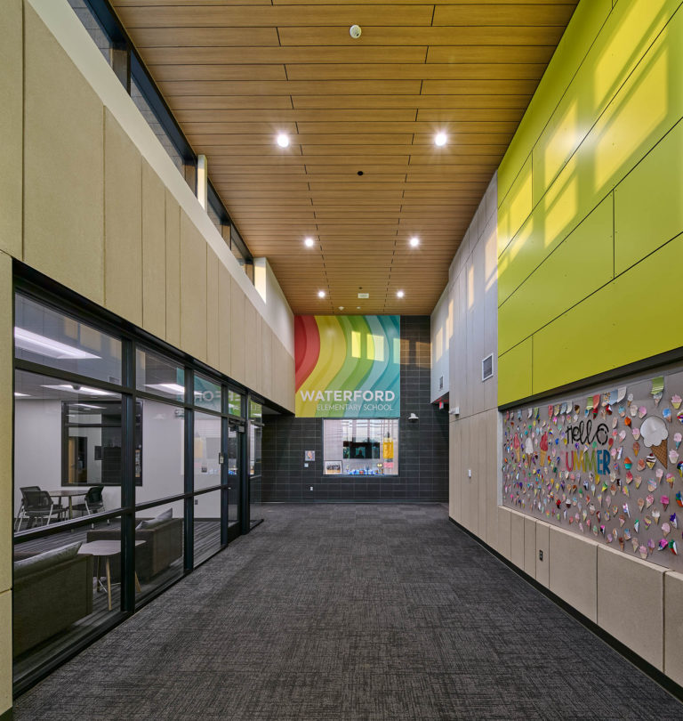 Interior main entry with rainbow graphic