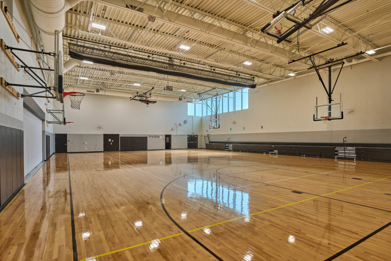 Gymnasium with clerestory curtain wall window
